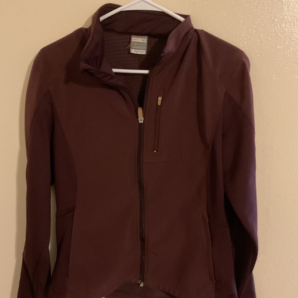 Nike maroon color size m woman zip up jacket